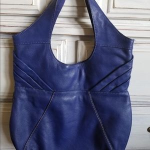 Lucky Brand royal blue purse in perfect condition.